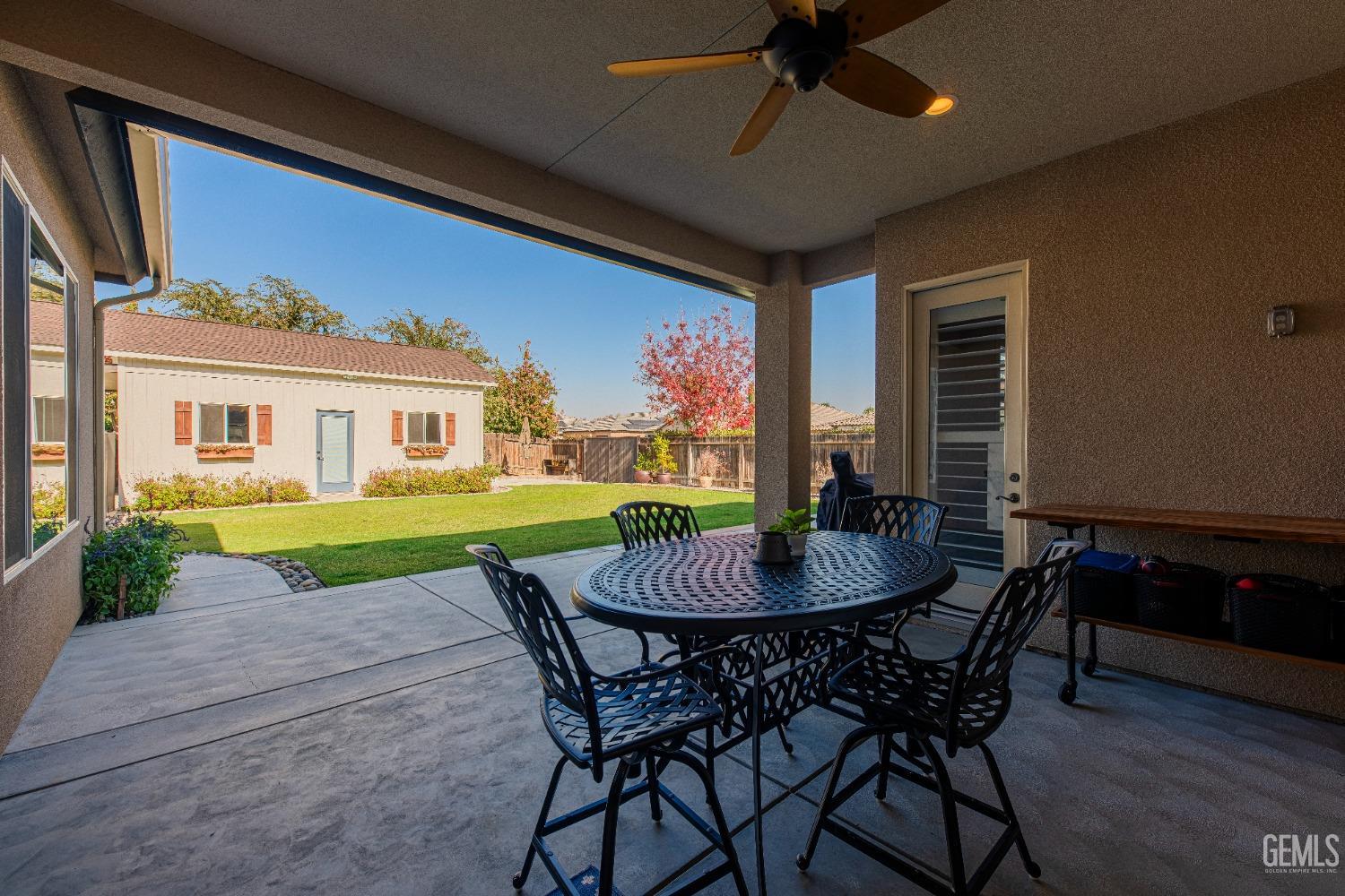 Undisclosed Address Bakersfield, CA 93312 - Photo 31 of 43 a view of a dining room with furniture window and wooden floor