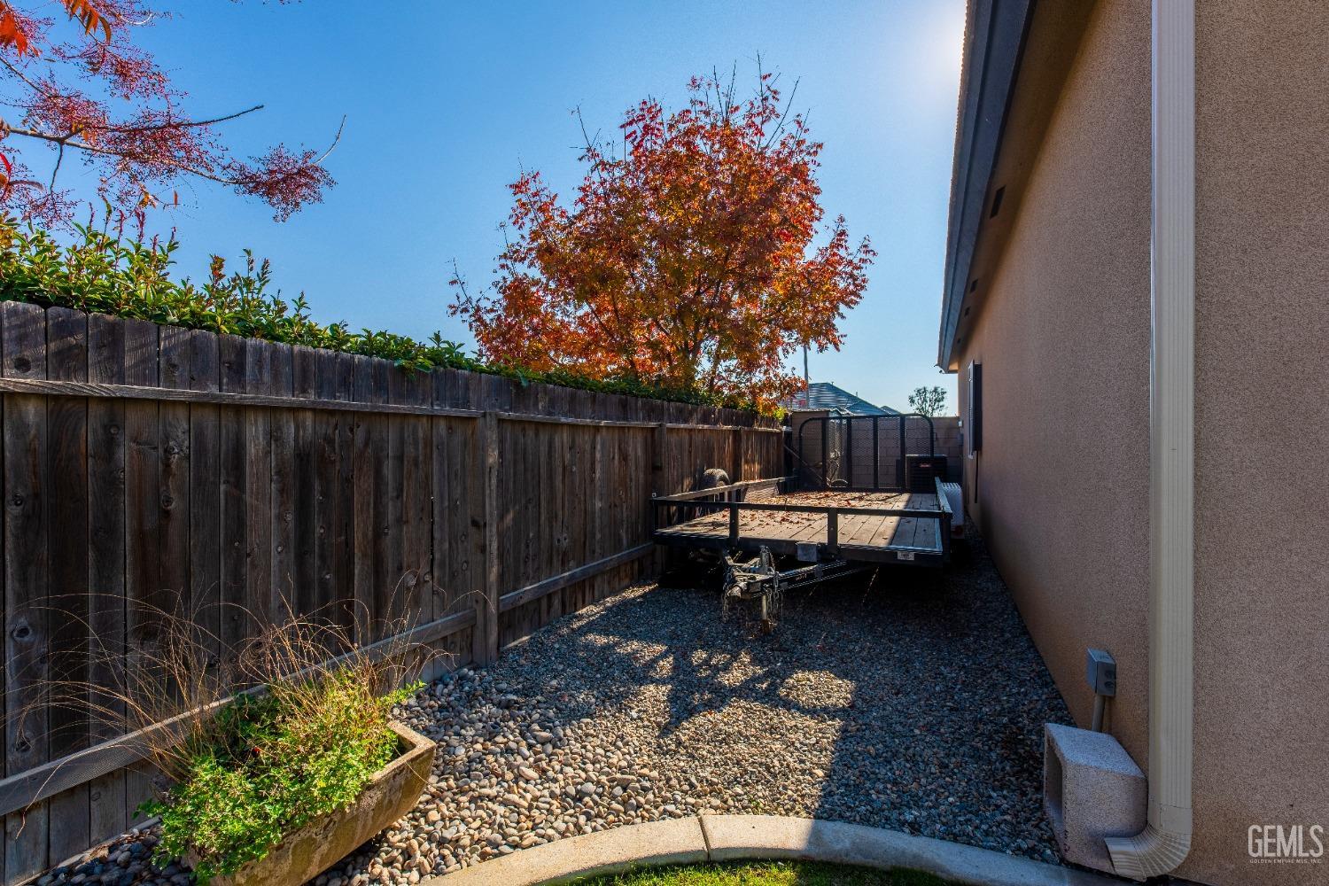 Undisclosed Address Bakersfield, CA 93312 - Photo 36 of 43 a house view with a sitting space and garden