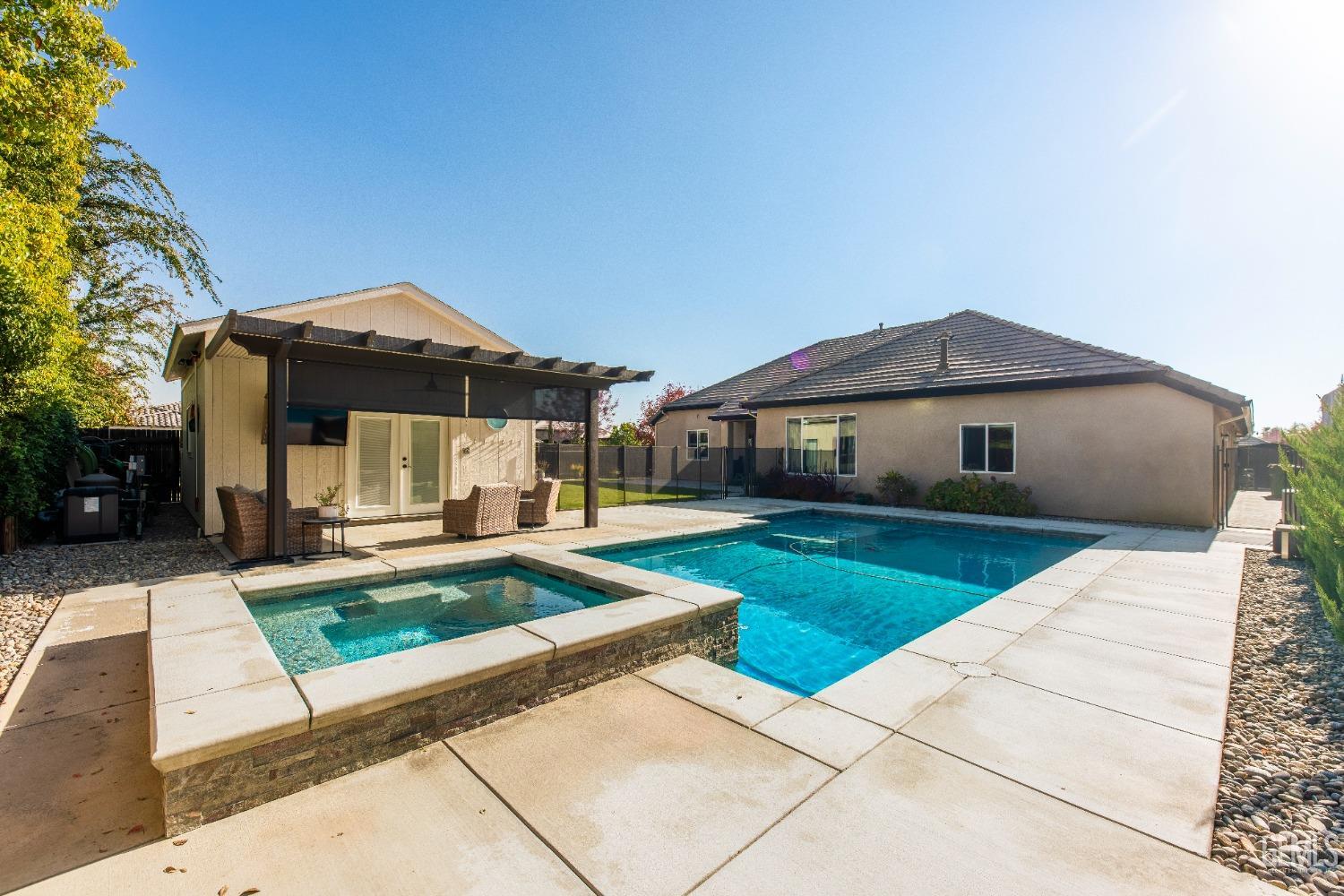 Undisclosed Address Bakersfield, CA 93312 - Photo 40 of 43 a front view of a house with a yard