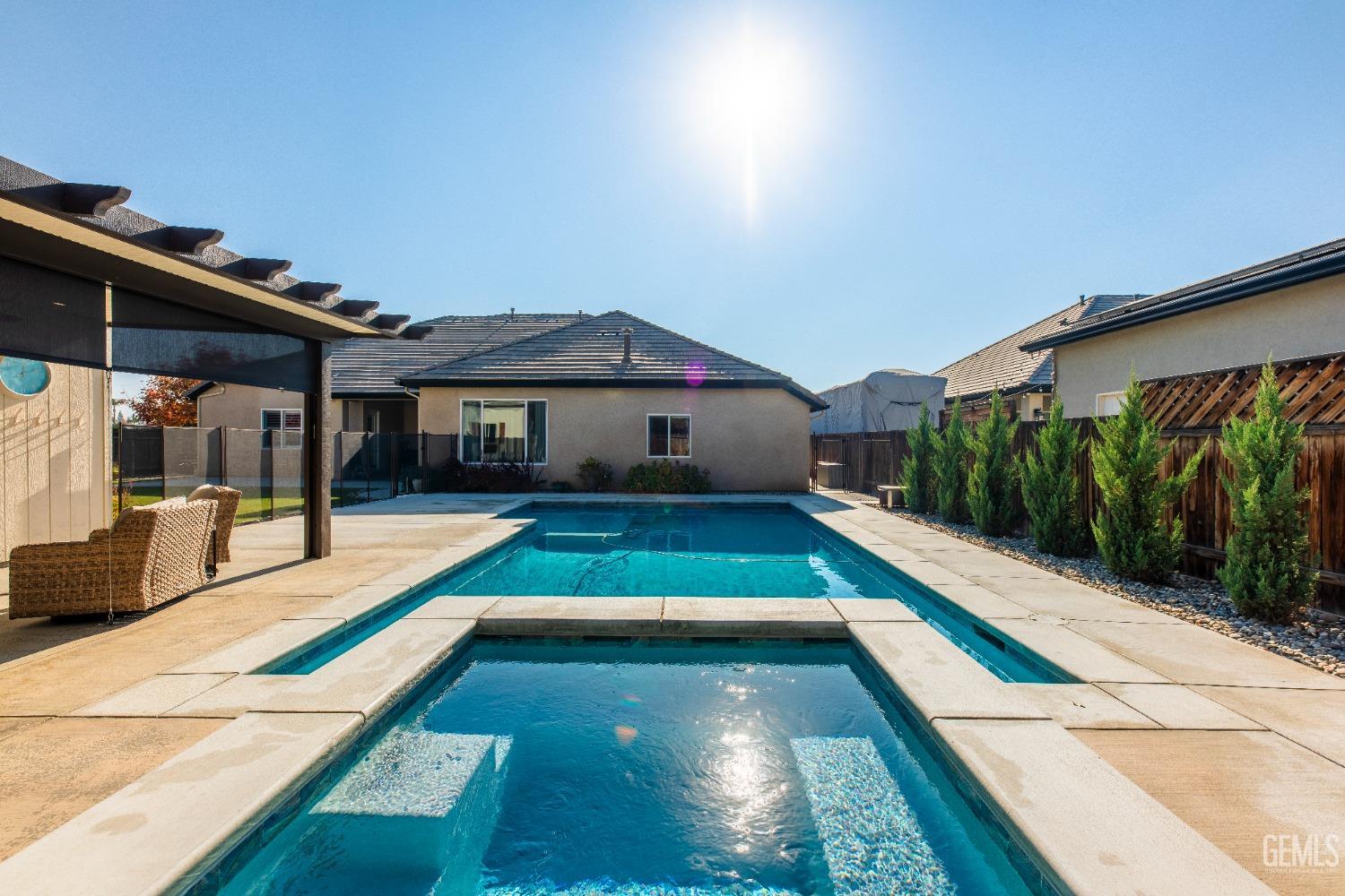 Undisclosed Address Bakersfield, CA 93312 - Photo 41 of 43 a house view with a swimming pool