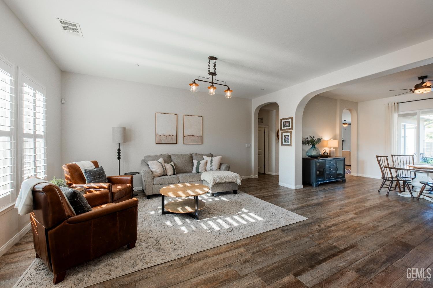 Undisclosed Address Bakersfield, CA 93312 - Photo 5 of 43 a living room with furniture
