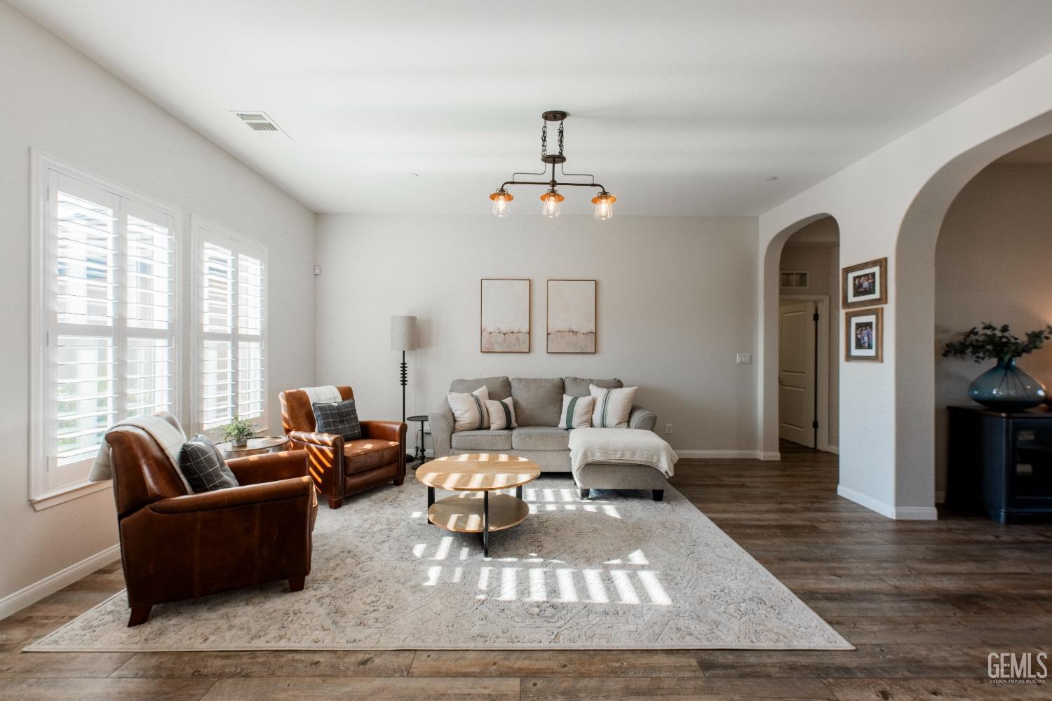 Undisclosed Address Bakersfield, CA 93312 - Photo 6 of 43 a living room with furniture flat screen tv and window