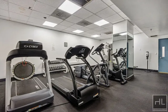 a view of a room with gym equipment