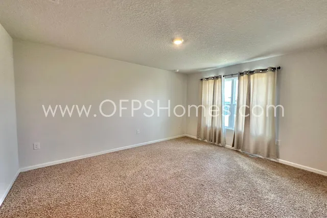 a view of a livingroom with an empty space