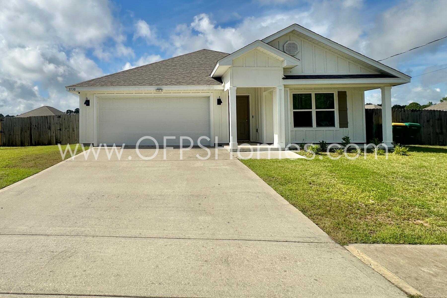 3530 Sugar Maple Lane Crestview, FL 32539 - Photo 3 of 19 a front view of a house with a yard