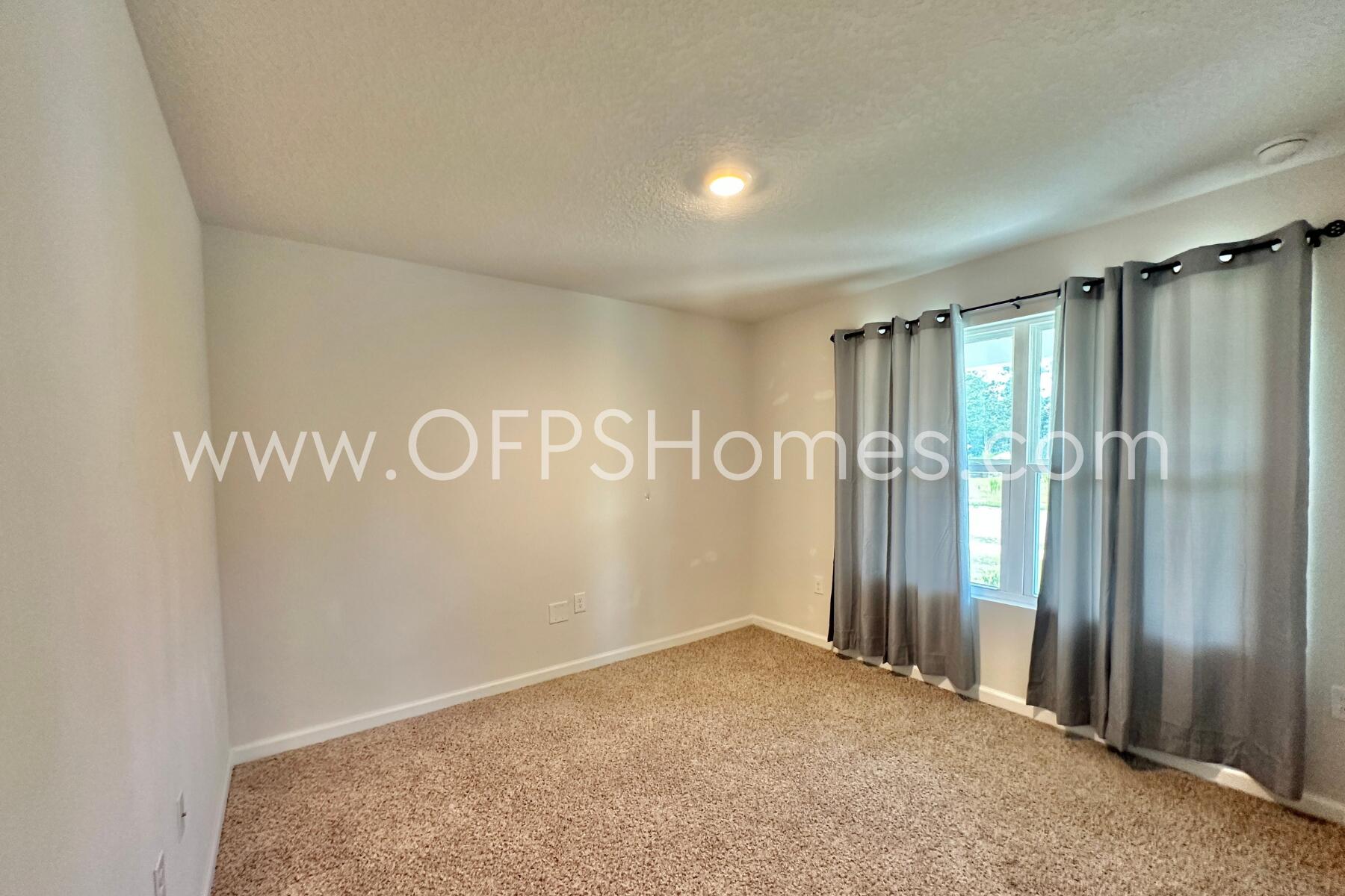 3530 Sugar Maple Lane Crestview, FL 32539 - Photo 4 of 19 a view of an empty room