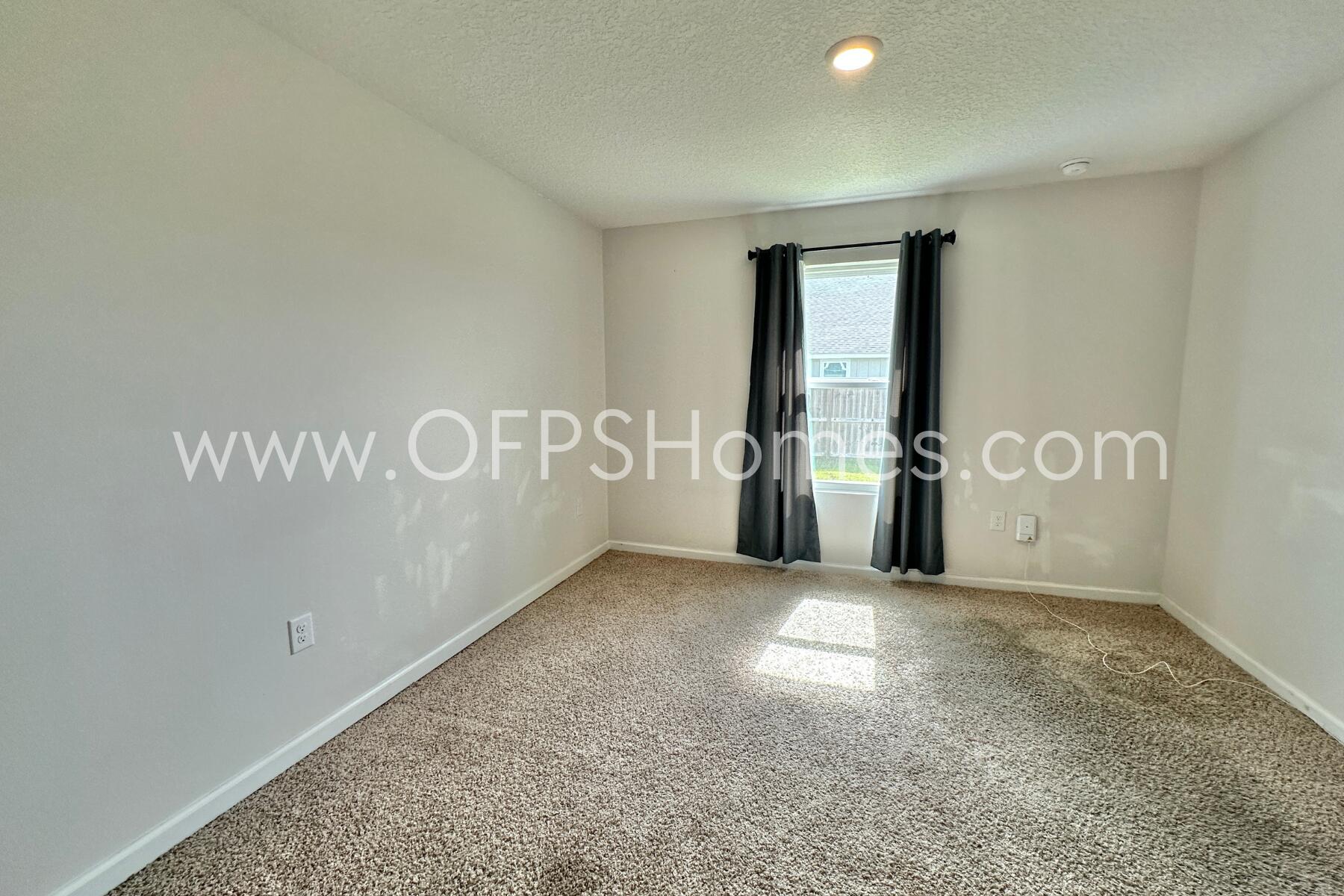 3530 Sugar Maple Lane Crestview, FL 32539 - Photo 9 of 19 an empty room with windows