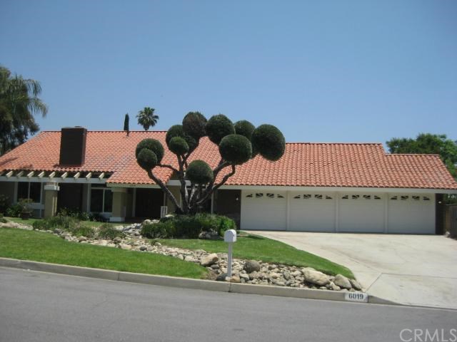 6019 Falling Tree Lane Rancho Cucamonga, CA 91737 - Photo 1 of 1 a front view of a house with a yard and potted plants