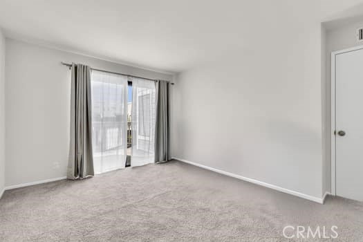 49 Remington Irvine, CA 92620 - Photo 11 of 26 a view of an empty room with glass door