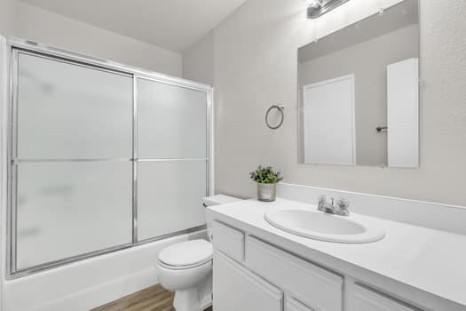 49 Remington Irvine, CA 92620 - Photo 18 of 26 a bathroom with a granite countertop sink toilet and shower