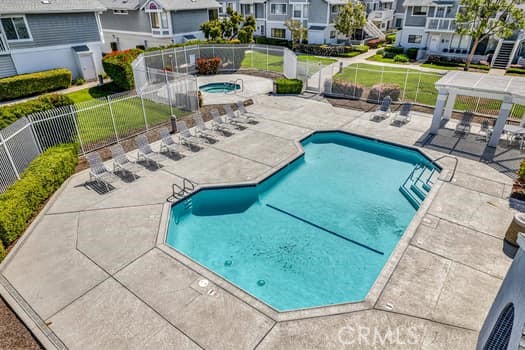 49 Remington Irvine, CA 92620 - Photo 22 of 26 a view of a swimming pool with lounge chair