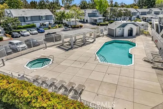 a view of a swimming pool with a patio