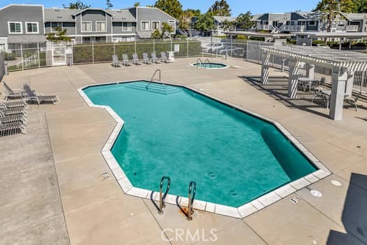 49 Remington Irvine, CA 92620 - Photo 24 of 26 a view of a swimming pool with a patio