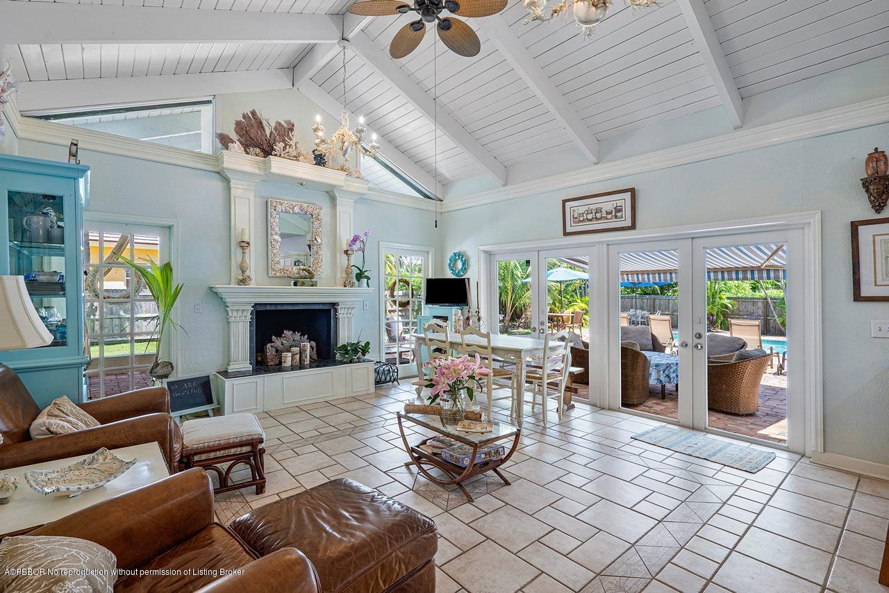15 East Ocean Avenue Ocean Ridge, FL 33435 - Photo 11 of 31 a living room with furniture and a fireplace
