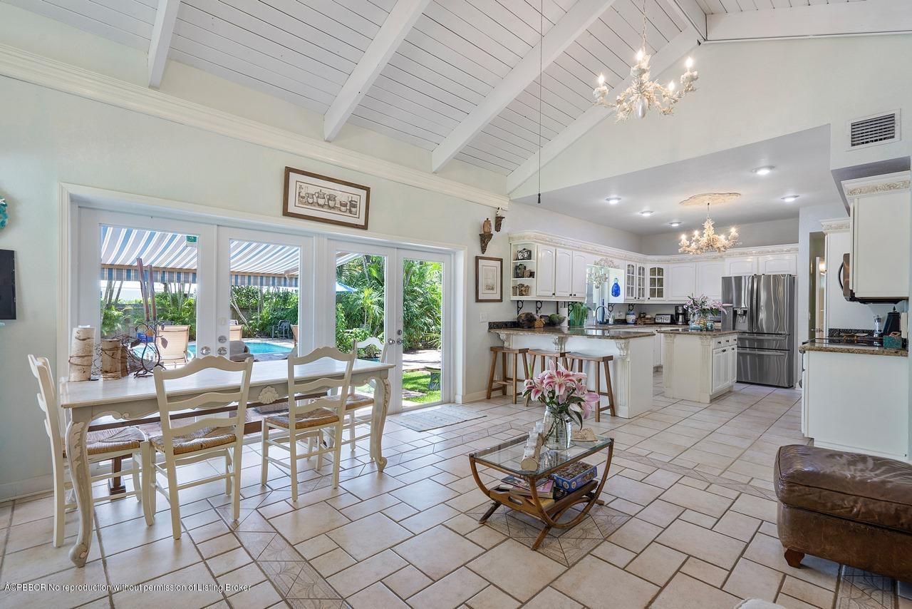 15 East Ocean Avenue Ocean Ridge, FL 33435 - Photo 12 of 31 a living room with furniture a dining table and kitchen view