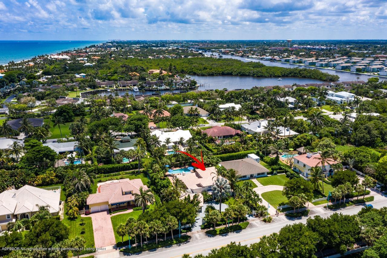 15 East Ocean Avenue Ocean Ridge, FL 33435 - Photo 27 of 31 an aerial view of residential houses with outdoor space and trees