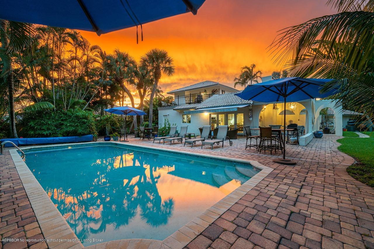 15 East Ocean Avenue Ocean Ridge, FL 33435 - Photo 5 of 31 a view of a swimming pool with a patio