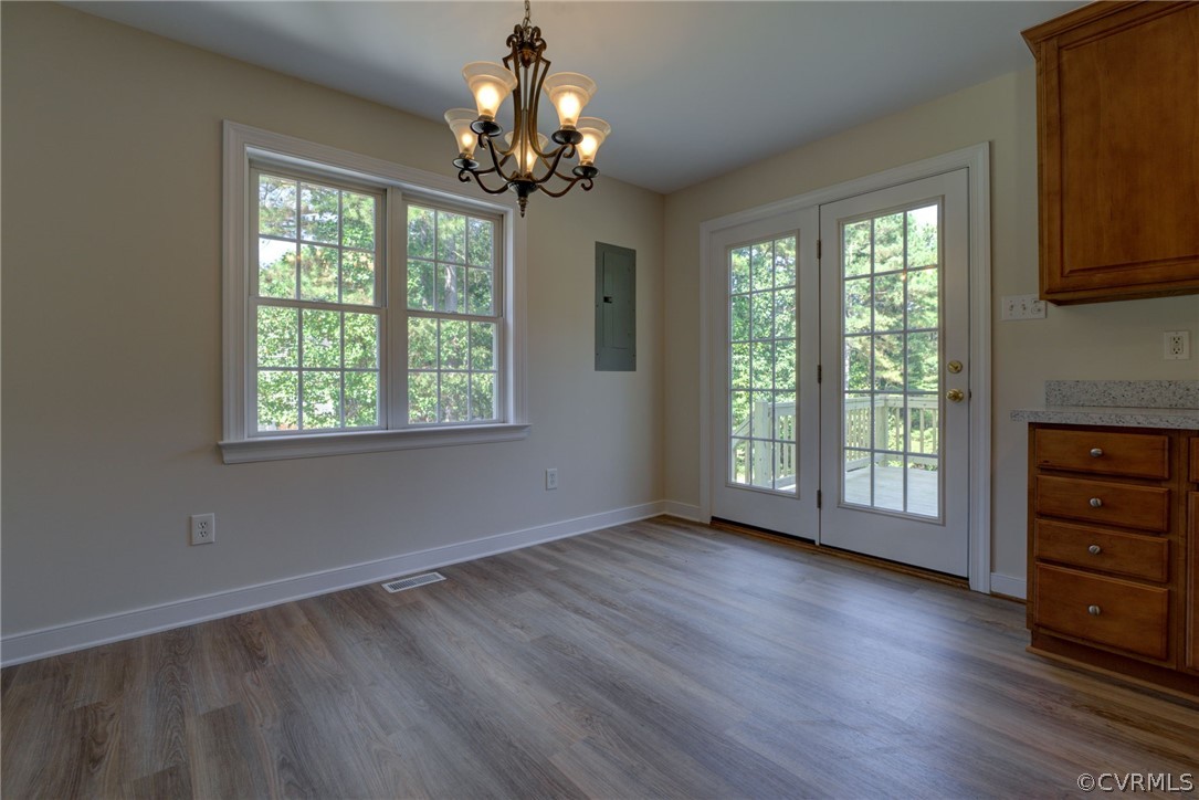 349 Deep Landing Road Tappahannock, VA 22560 - Photo 9 of 28 Dining area of Kitchen with new french doors leadi