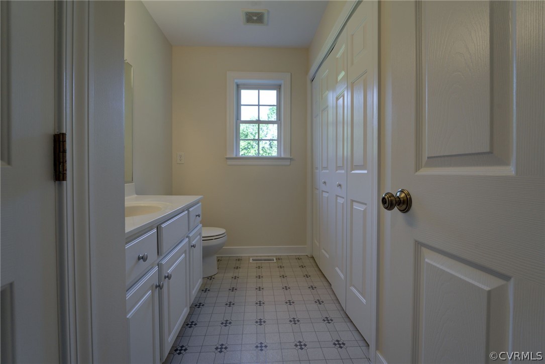 349 Deep Landing Road Tappahannock, VA 22560 - Photo 10 of 28 Hall half Bath & utility.