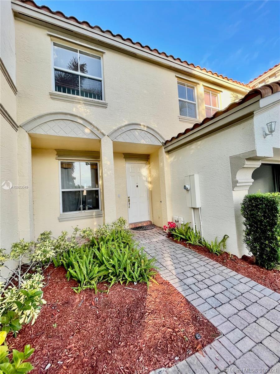 16237 Southwest 48th Street Miramar, FL 33027 - Photo 2 of 28 a view of a house with a yard