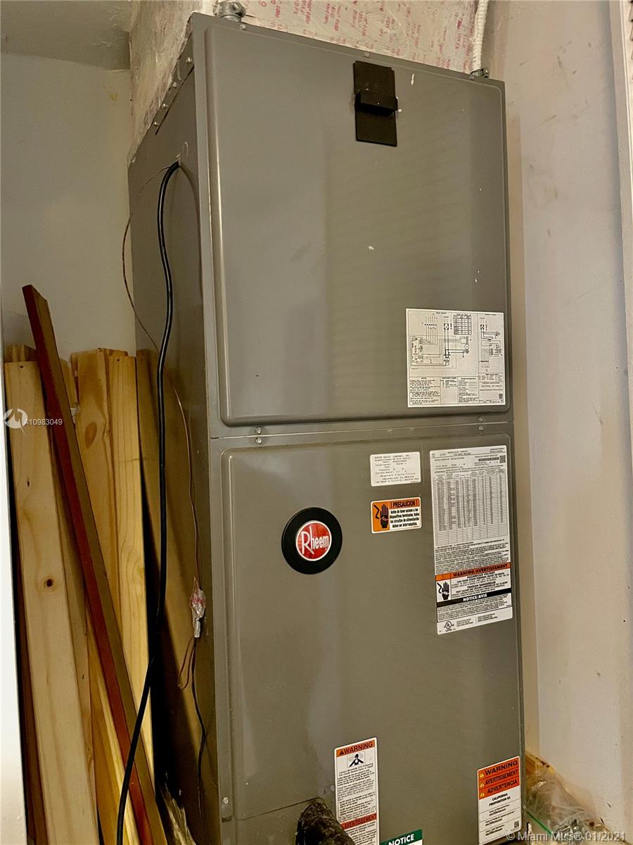 16237 Southwest 48th Street Miramar, FL 33027 - Photo 23 of 28 a view of water heater room