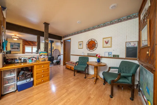 a bathroom with a toilet a sink and a mirror