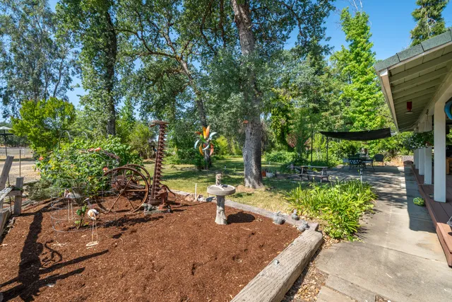 a backyard of a house with lots of green space