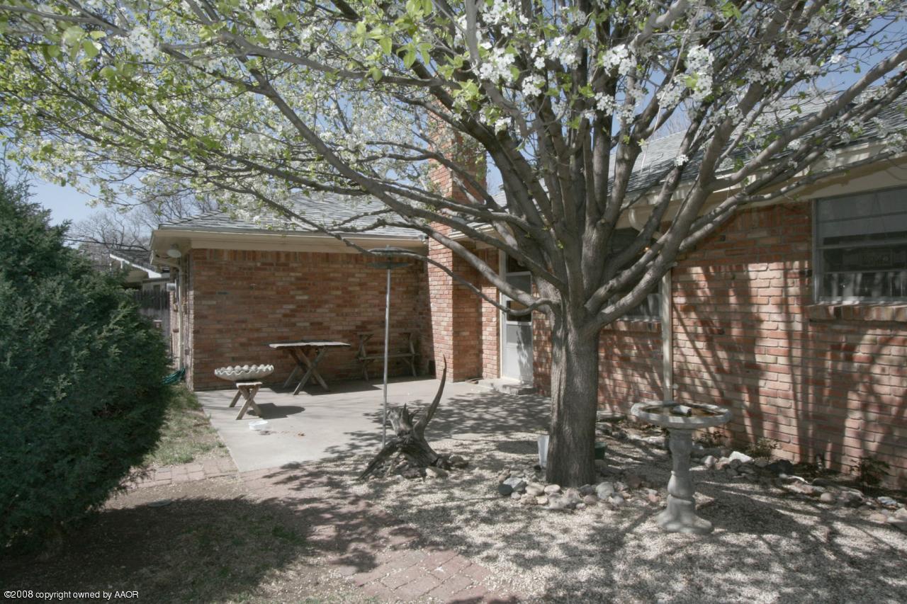 6711 Elmhurst Road Amarillo, TX 79106 - Photo 15 of 15 a view of house with a yard
