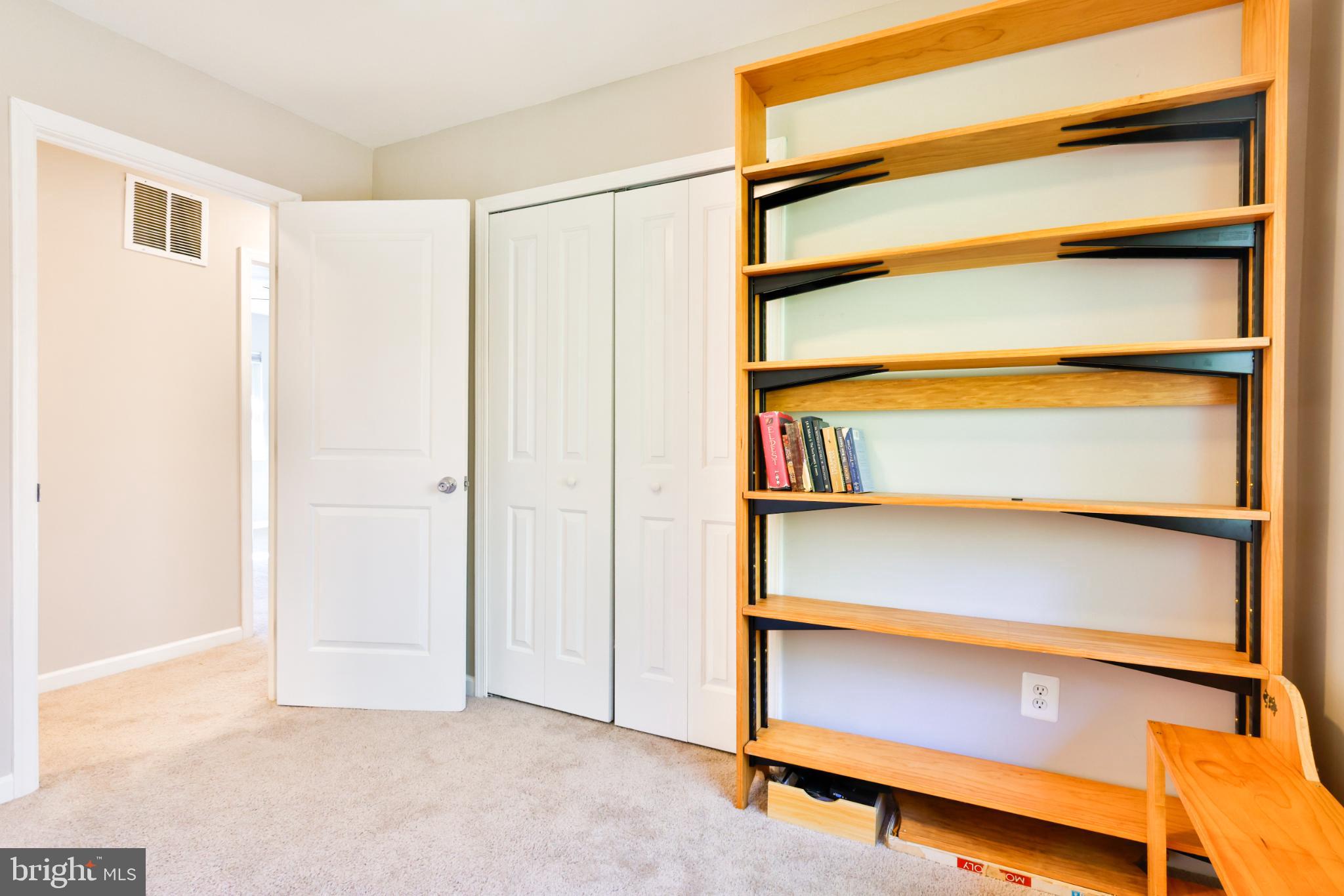 11817 Coopers Court Reston, VA 20191 - Photo 26 of 58 a view of walk in closet with empty racks