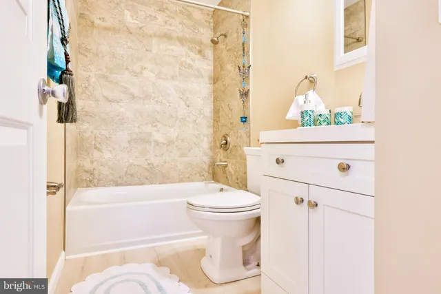 a view of empty room with window and stairs
