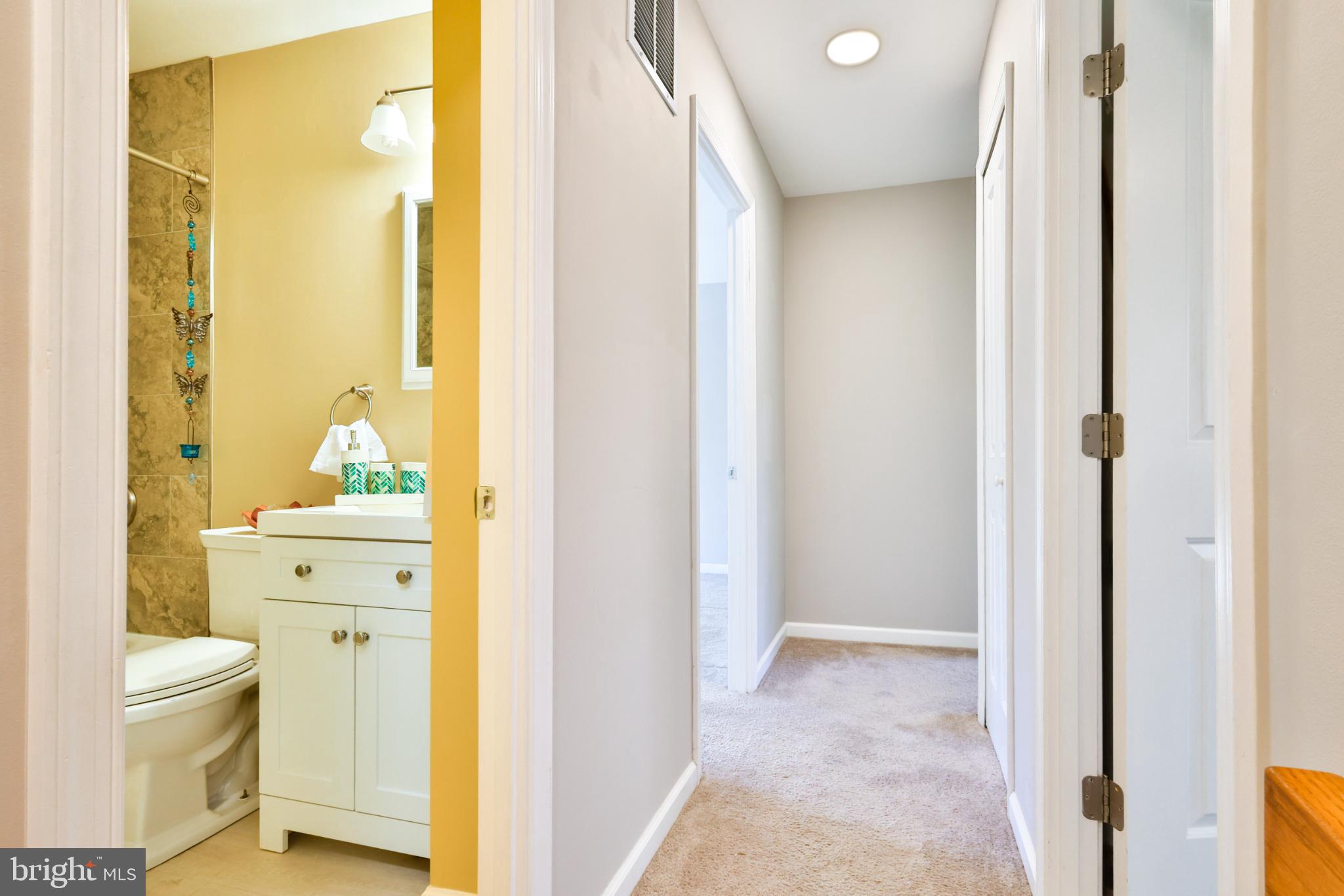 11817 Coopers Court Reston, VA 20191 - Photo 31 of 58 a view of a bathroom with a shower and a bathroom