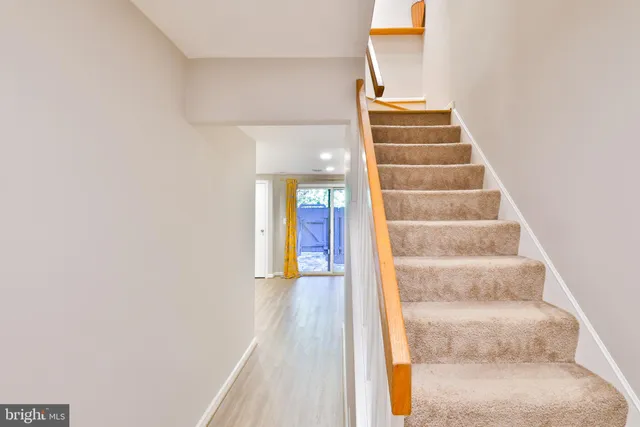 a room with furniture and wooden floor
