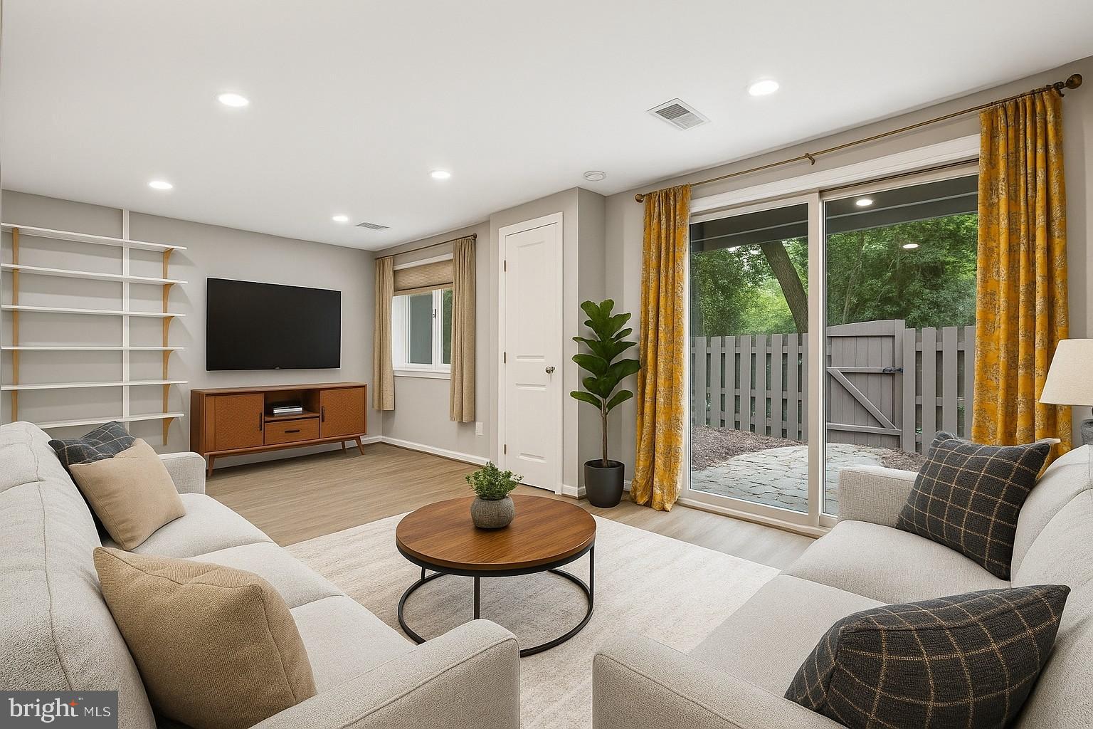 11817 Coopers Court Reston, VA 20191 - Photo 38 of 58 a living room with furniture and a flat screen tv