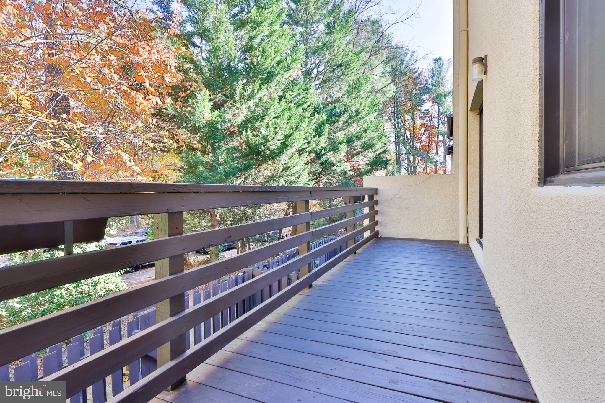 11817 Coopers Court Reston, VA 20191 - Photo 45 of 58 a view of a balcony with wooden floor