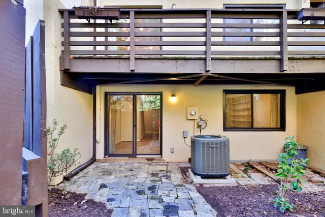 a view of a lake with houses in the back