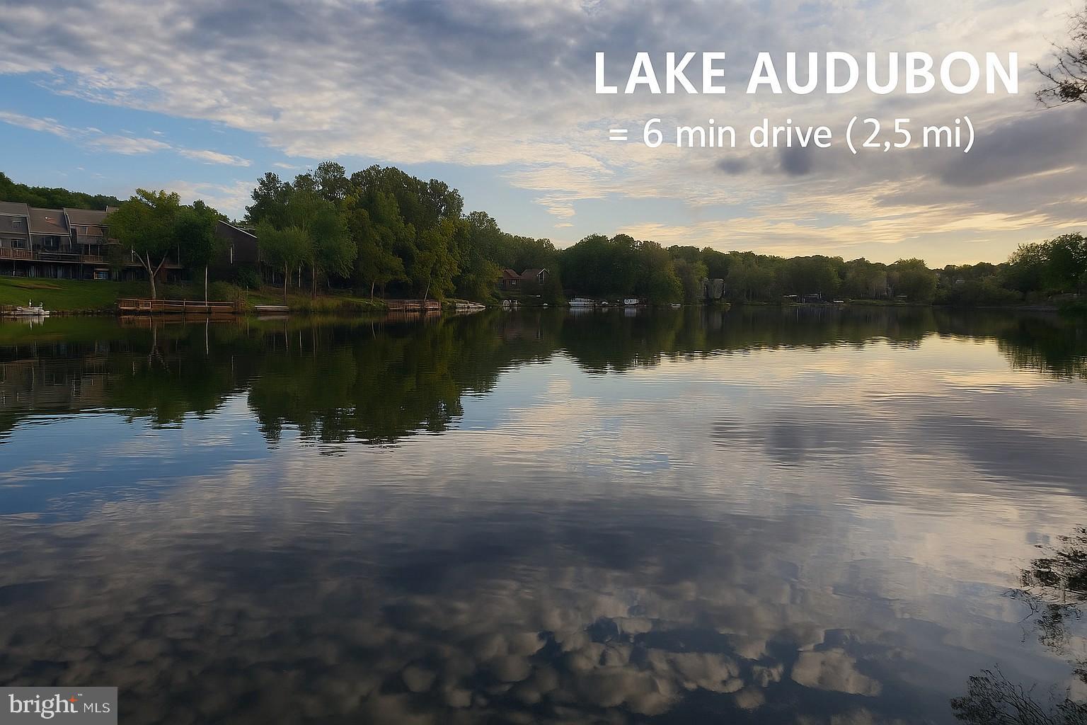 11817 Coopers Court Reston, VA 20191 - Photo 55 of 58 a view of a lake with houses in the back