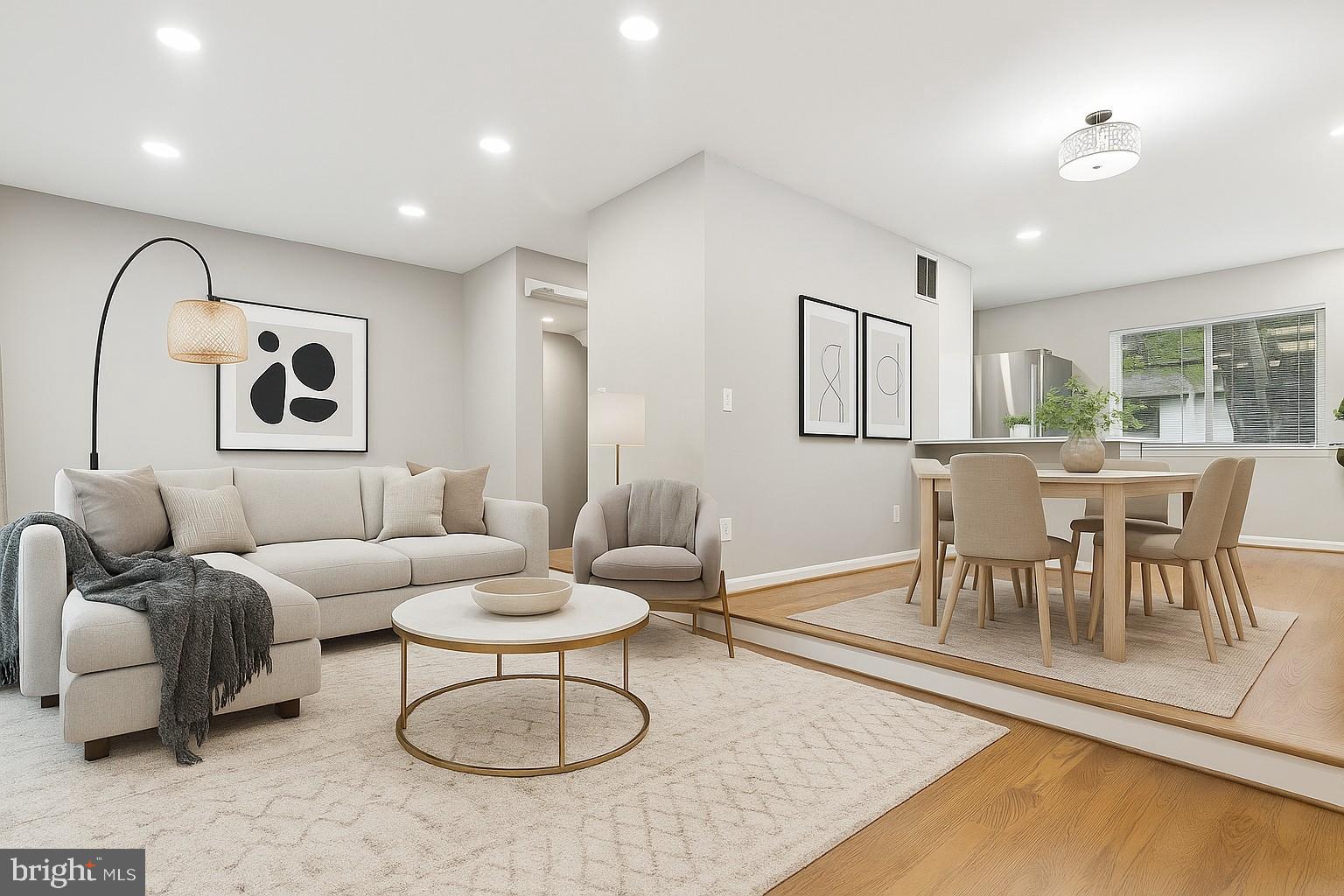 11817 Coopers Court Reston, VA 20191 - Photo 7 of 58 a living room with furniture and a dining table with rug