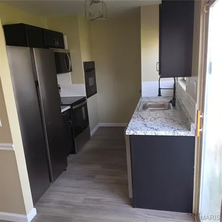 $74,900 | 6670 Chesapeake Drive, Unit D, Florissant, MO 63033
