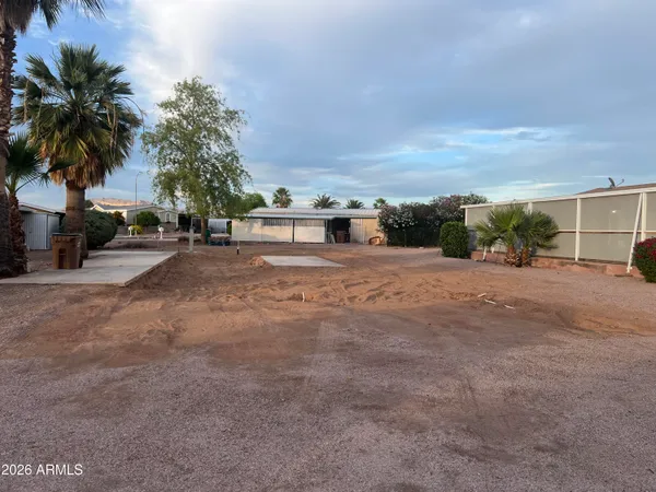 a view of a backyard of a house