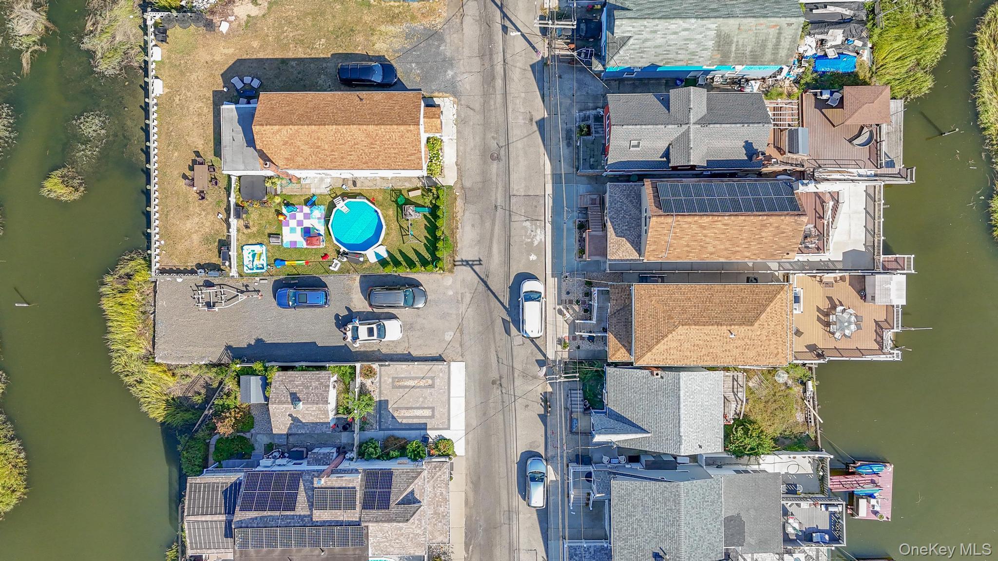 21 West 18th Road Queens, NY 11693 - Photo 3 of 3 an aerial view of houses and roads