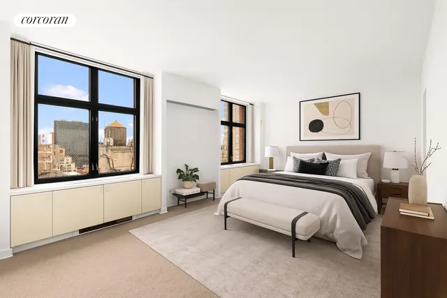 a spacious bedroom with a bed and a large window