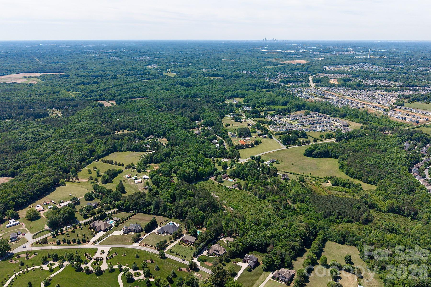 13745 Ramah Church Road Huntersville, NC 28078 - Photo 8 of 17 an aerial view of multiple house