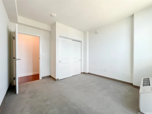 an empty room with closet