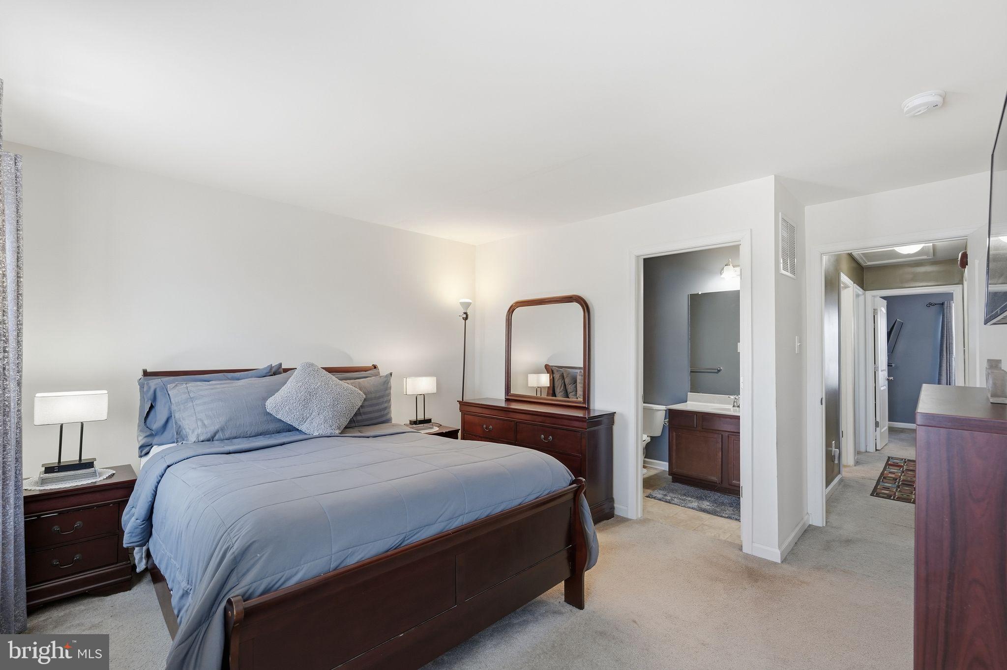 153 Mercer Court Fairless Hills, PA 19030 - Photo 14 of 29 a bedroom with a bed and a dresser