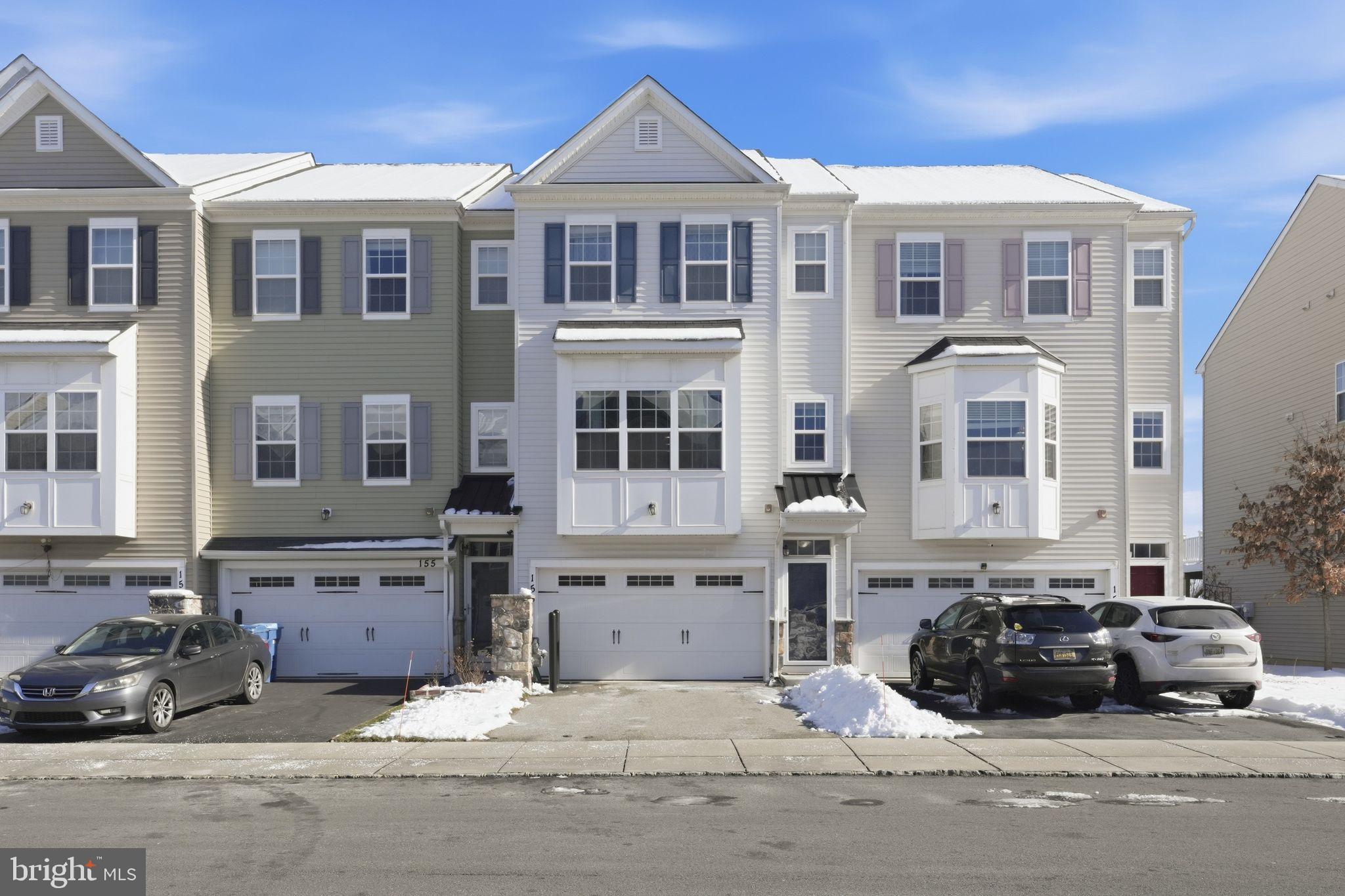153 Mercer Court Fairless Hills, PA 19030 - Photo 2 of 29 a car parked in front of a building