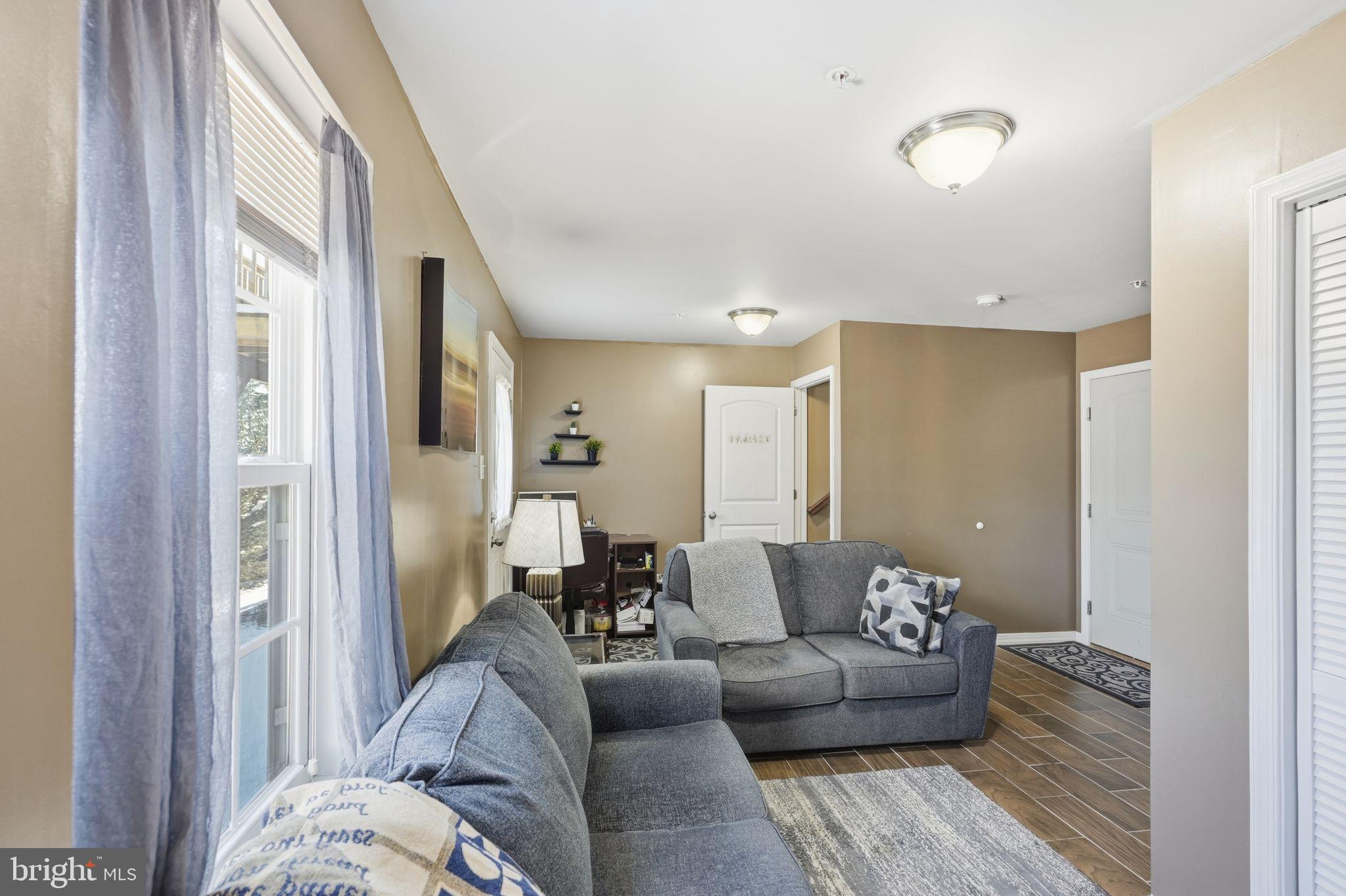 153 Mercer Court Fairless Hills, PA 19030 - Photo 25 of 29 a living room with furniture and a couch