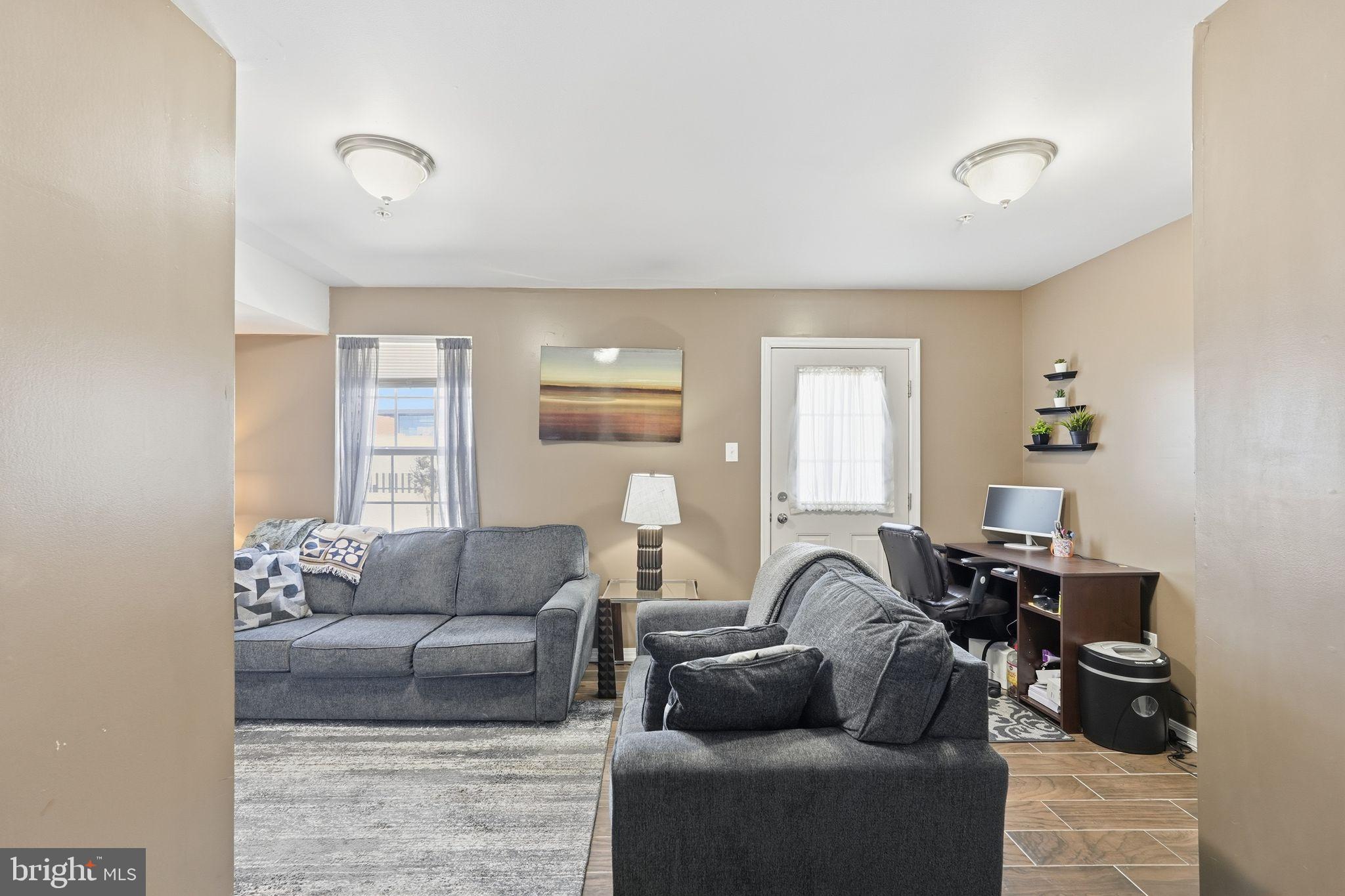 153 Mercer Court Fairless Hills, PA 19030 - Photo 26 of 29 a living room with furniture and a couch