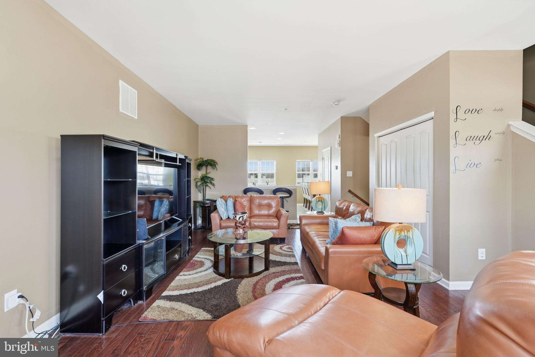 153 Mercer Court Fairless Hills, PA 19030 - Photo 10 of 29 a living room with furniture and a flat screen tv