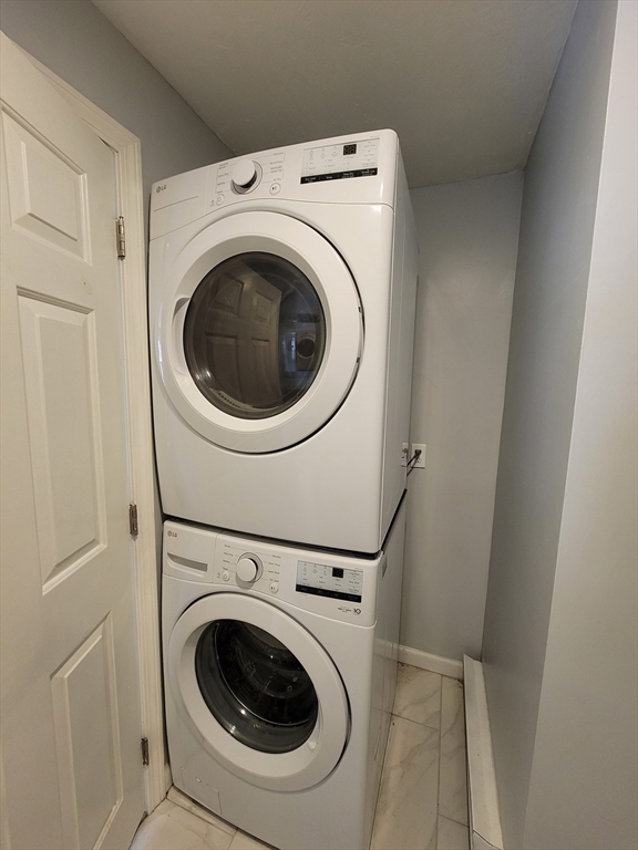 7 Gibbs Street, Unit 7 Worcester, MA 01607 - Photo 17 of 20 a utility room with dryer and washer