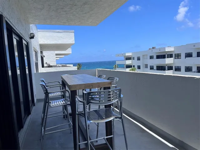 a view of a city with tall buildings